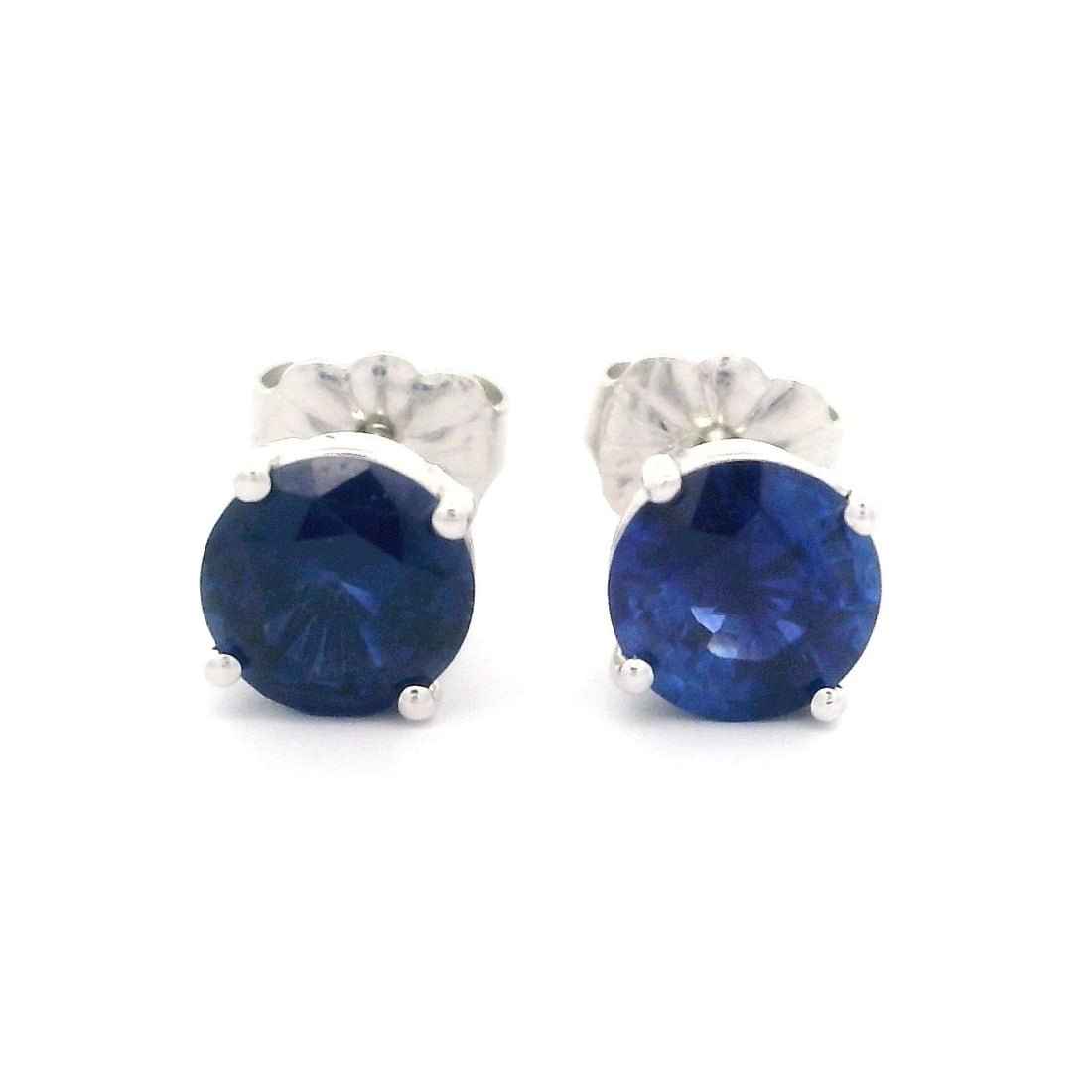 New 14k White Gold 1.80ct Royal Blue Sapphire Stud Earrings: New 14k White Gold 1.80ct Royal Blue Sapphire Stud Earrings Discover these exquisite stud earrings crafted from solid 14k white gold, featuring stunning royal blue sapphires. Each earring showcases a 