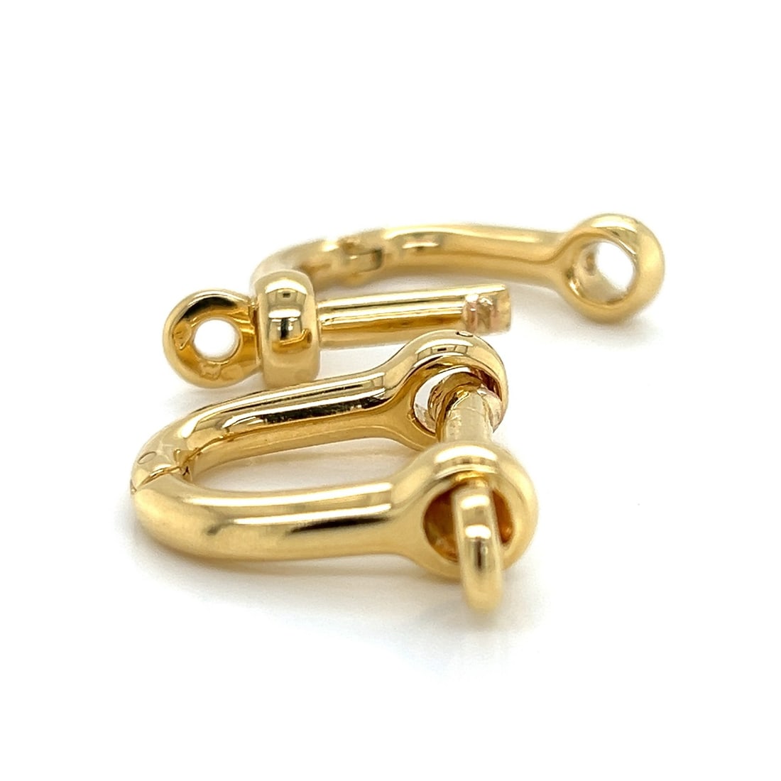 Van Cleef Arpels Oval Hoop Cufflinks 14k Yellow Gold with Paper: Van Cleef Arpels Oval Hoop Cufflinks 14k Yellow Gold with Paper Authentic oval hoop cufflinks by Van Cleef & Arpels, crafted in solid 14k yellow gold with distinctive screw bolt key detailing. The ope