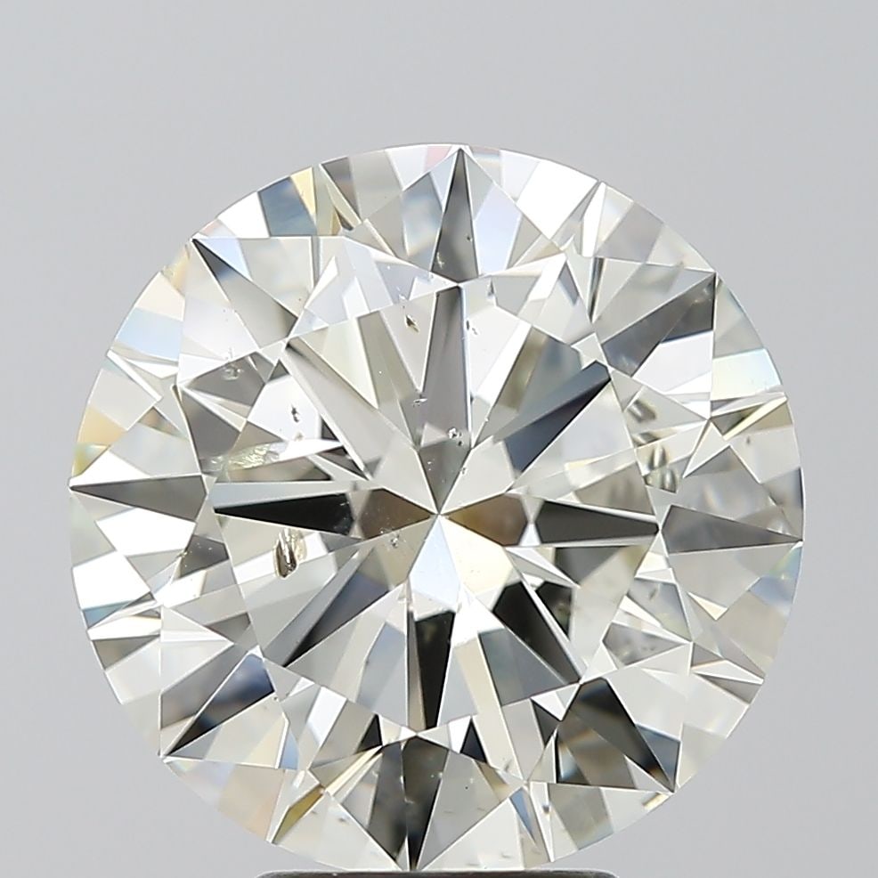 Loose Diamond - ROUND 5.53ct J SI2: Loose Diamond - ROUND 5.53ct J SI2 Source: Natural Shape: ROUND Carats: 5.53 Color: J Clarity: SI2 Certification: IGI Video: