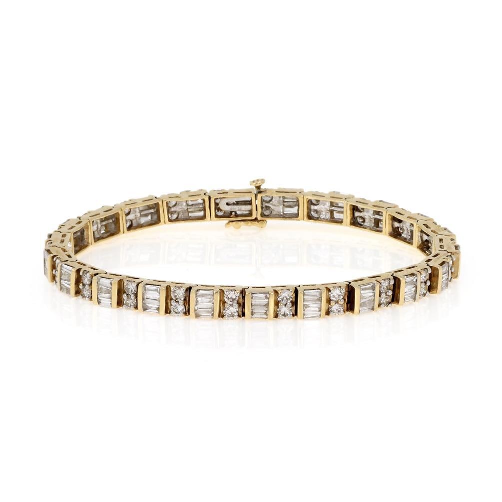 14k Yellow Gold Diamond Tennis Bracelet 6.00ct Round Baguette 7.5": 14k Yellow Gold Diamond Tennis Bracelet 6.00ct Round Baguette 7.5" This exquisite tennis bracelet is crafted from 14k yellow gold, showcasing a stunning design with alternating round and baguette cut 