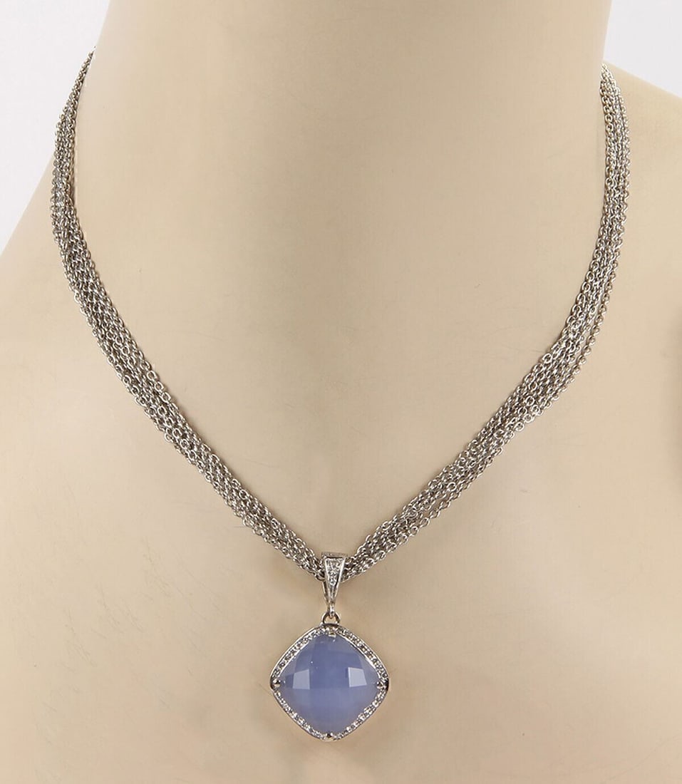 Rina Limor 18k White Gold Pendant Necklace Blue Chalcedony and Diamonds: Rina Limor 18k White Gold Pendant Necklace Blue Chalcedony and Diamonds Pre-owned pendant necklace crafted in 18k white gold, featuring a faceted blue chalcedony centerpiece accented by natural diamon