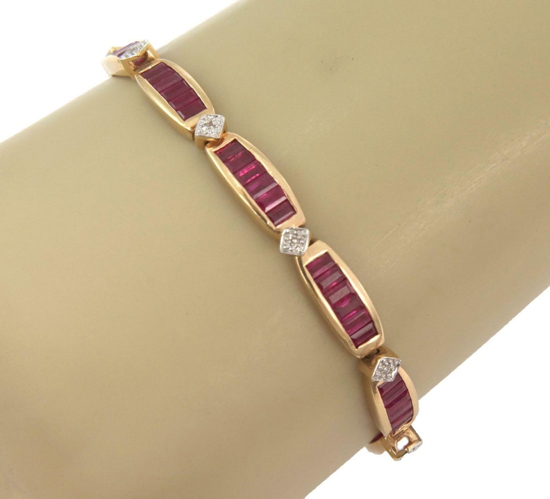 14k Rose Gold Tennis Bracelet with 15 Ct Baguette Rubies and Diamonds: 14k Rose Gold Tennis Bracelet with 15 Ct Baguette Rubies and Diamonds This exquisite bracelet is beautifully crafted from 14k rose gold and features 10 curved bar link frames, each adorned with baguet
