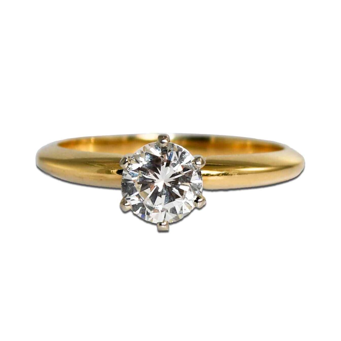 Natural Diamond 14K Yellow Gold Solitaire Ring Size 7.25: Natural Diamond 14K Yellow Gold Solitaire Ring Size 7.25 This diamond solitaire engagement ring features a 1.00 carat round brilliant cut diamond set in a six-prong 14k yellow gold setting. The diamon
