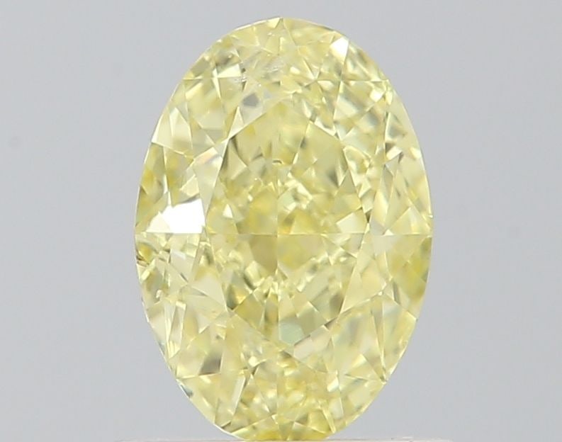 Loose Diamond - OVAL 0.89ct Fancy Yellow SI1: Loose Diamond - OVAL 0.89ct Fancy Yellow SI1 Source: Natural Shape: OVAL Carats: 0.89 Color: Fancy Yellow Certification: GIA Video: