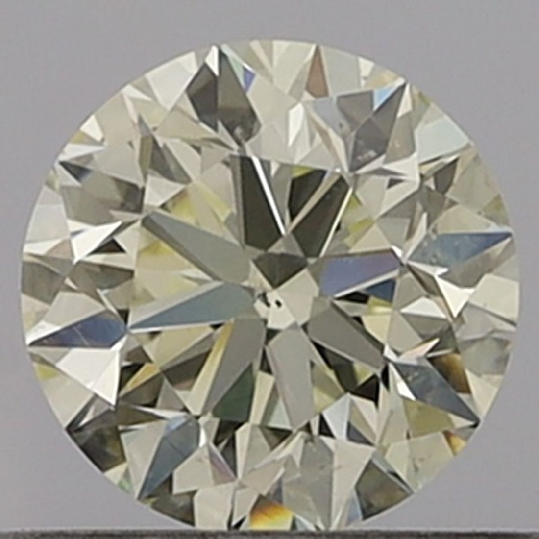 Loose Diamond - ROUND 0.6ct N SI1: Loose Diamond - ROUND 0.6ct N SI1 Source: Natural Shape: ROUND Carats: 0.6 Color: N Clarity: SI1 Certification: GIA Video: