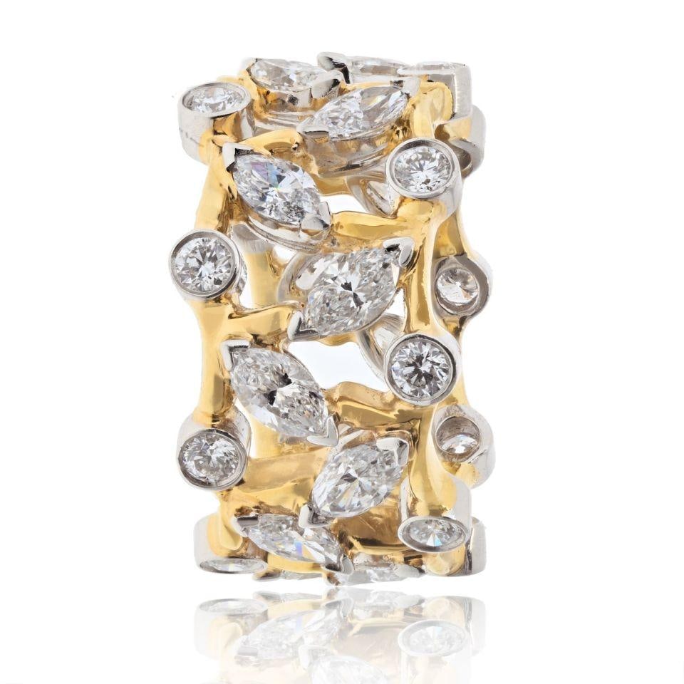 Schlumberger Vigne Diamond Ring in Platinum and 18K Gold by Tiffany & Co.: Schlumberger Vigne Diamond Ring in Platinum and 18K Gold by Tiffany & Co. This Tiffany & Co. Schlumberger Vigne ring is crafted from platinum and 18K yellow gold, featuring marquise and round brillian
