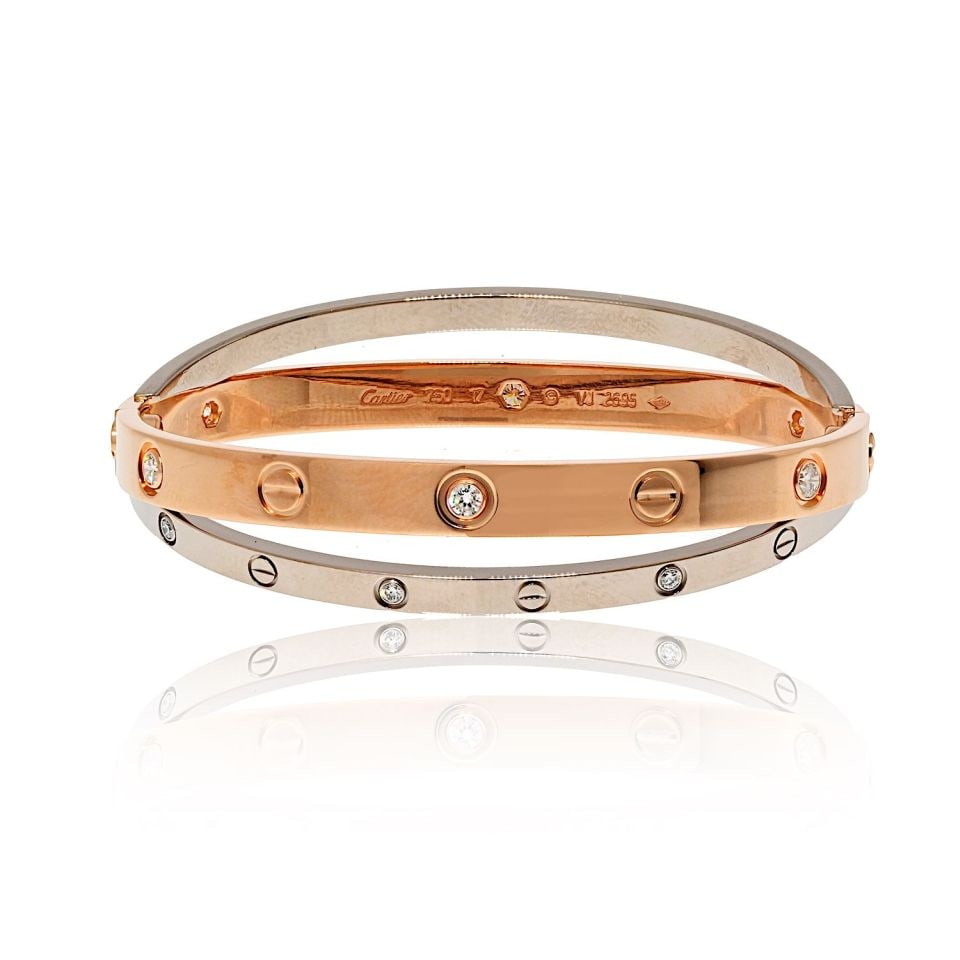 Cartier 18K White Rose Gold LOVE Bracelet 12 Diamonds Size 17: Cartier 18K White Rose Gold LOVE Bracelet 12 Diamonds Size 17 This exquisite Cartier 18K White and Rose Gold LOVE Bracelet is a stunning blend of elegance and craftsmanship. Adorned with 12 round bril
