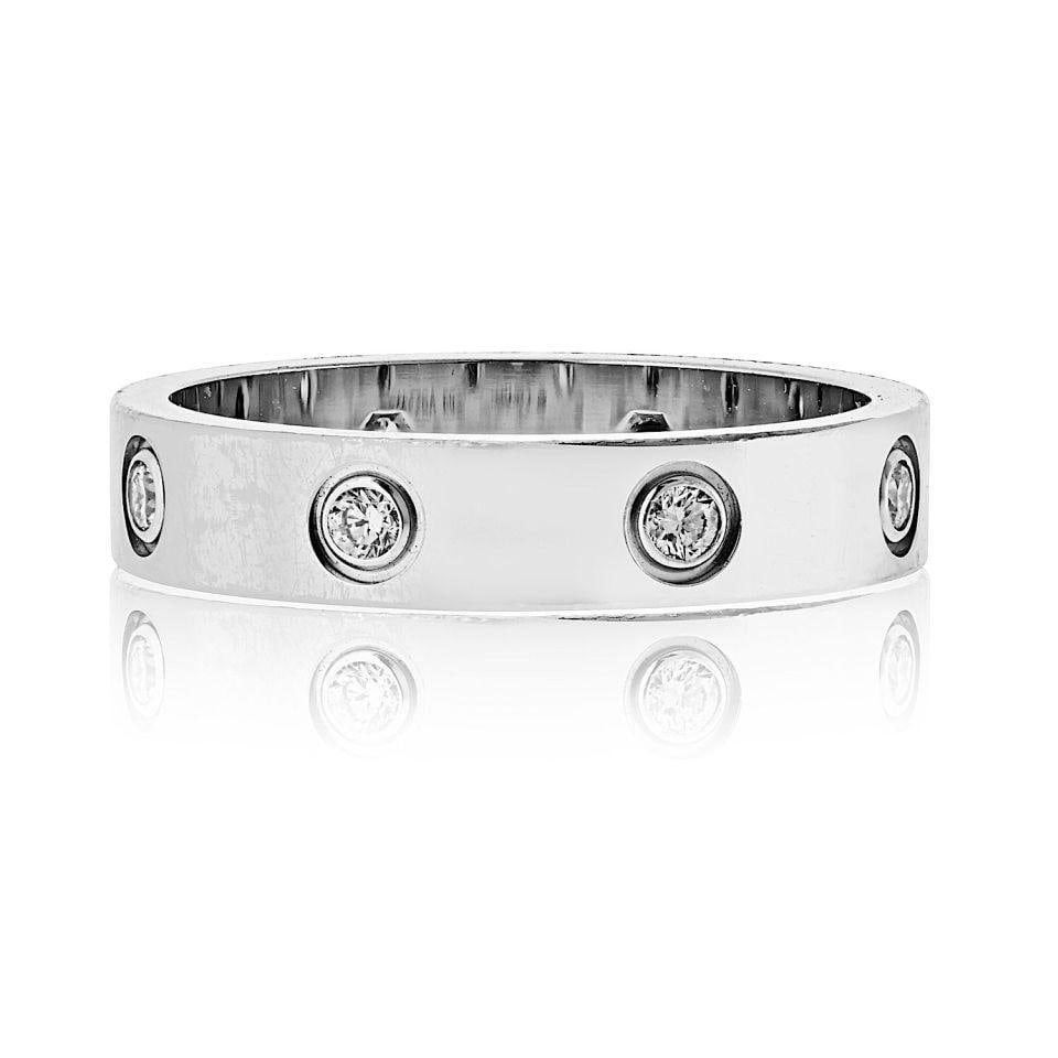 Cartier Love Mini Diamond Band in 18K White Gold Size 53 with Box: Cartier Love Mini Diamond Band in 18K White Gold Size 53 with Box This Cartier Love mini diamond ring is crafted in 18K white gold and features brilliant round-cut diamonds set within each signature s