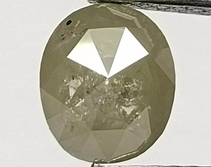 Loose Diamond - OVAL 1.39ct Salt and Pepper I3: Loose Diamond - OVAL 1.39ct Salt and Pepper I3 Source: Natural Shape: OVAL Carats: 1.39 Color: Salt and Pepper Certification: NONE The Diamond Depot Guarantee: All items in this auction are guaranteed