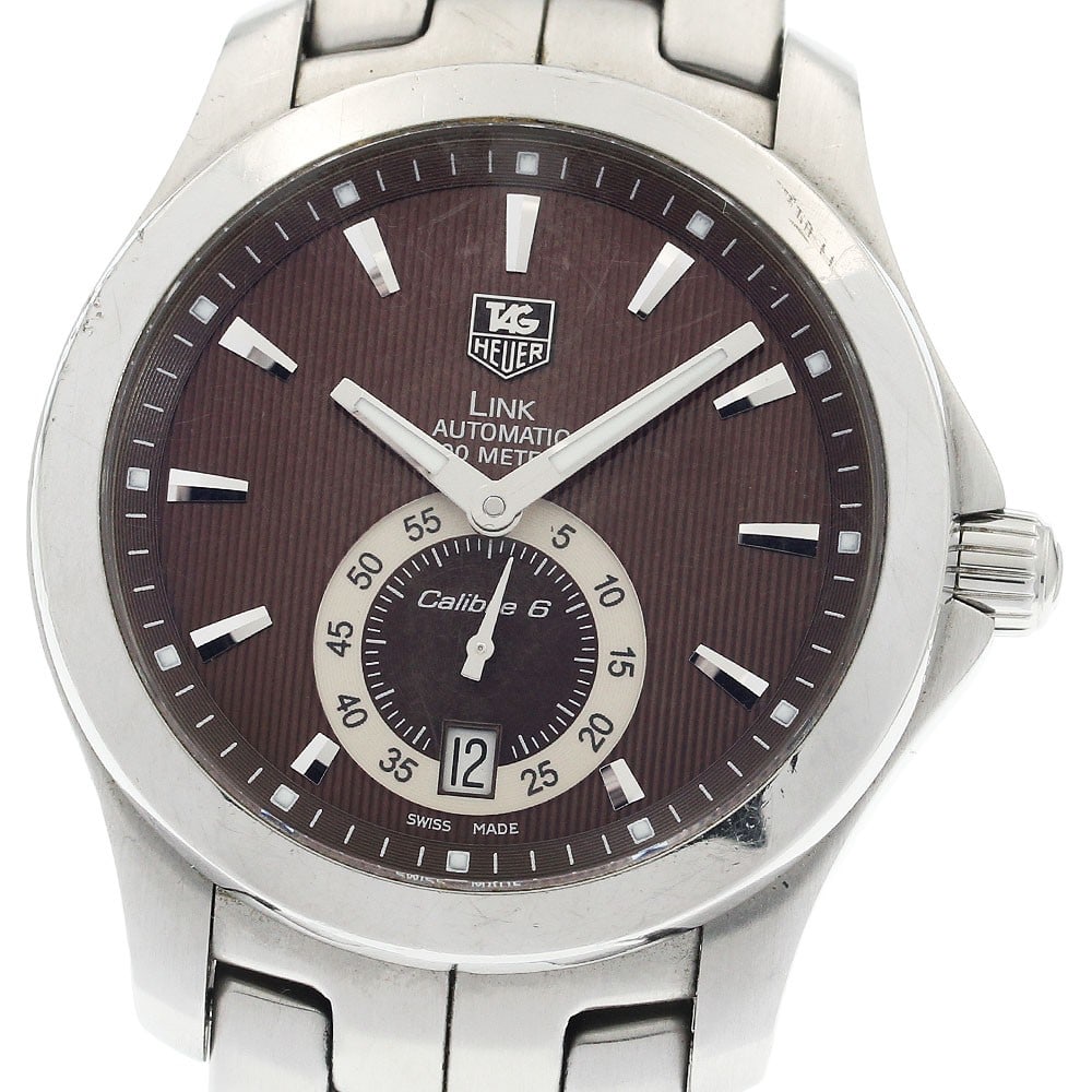 TAG Heuer Link Caliber 6 Automatic Date Men's Stainless Steel Watch: TAG Heuer Link Caliber 6 Automatic Date Men's Stainless Steel Watch This TAG Heuer Link Caliber 6 men's wristwatch features a stainless steel case and band with a brown dial. The watch is powered by a