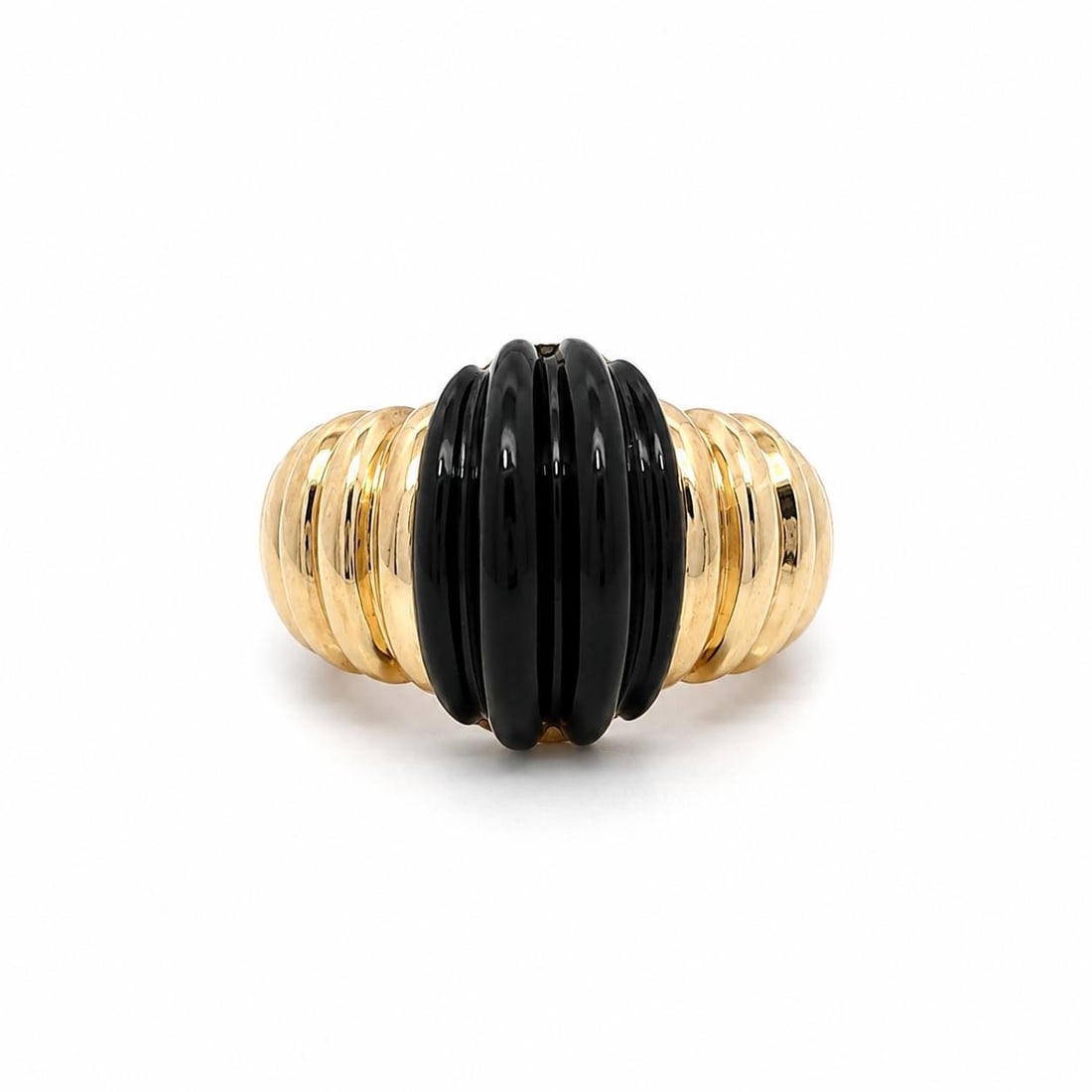 Wide Band Ring in 14k Yellow Gold with Carved Black Onyx: Wide Band Ring in 14k Yellow Gold with Carved Black Onyx A wide band ring featuring one natural black onyx stone with a carved grooved cut. The ring is made of solid 14k yellow gold and is sized at 4.