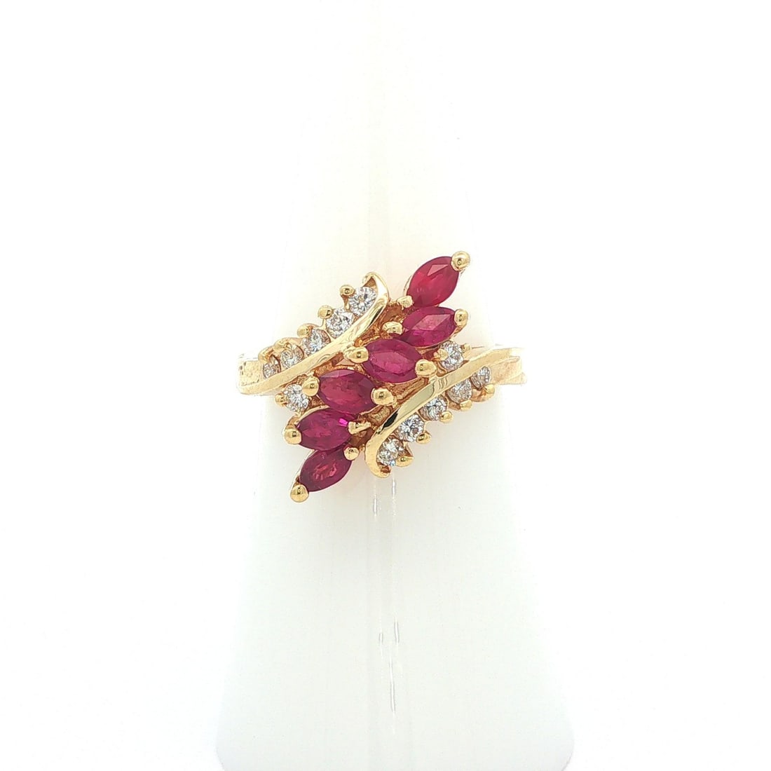 14k Yellow Gold Cocktail Ring with Marquise Rubies and Round Diamonds: 14k Yellow Gold Cocktail Ring with Marquise Rubies and Round Diamonds Vintage bypass cluster ring crafted in solid 14k yellow gold, featuring natural marquise-cut rubies and round brilliant-cut diamon