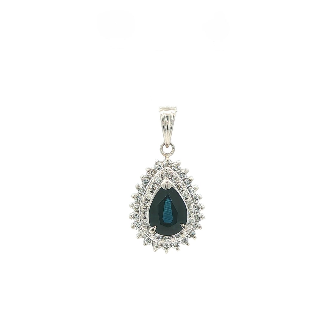 Platinum Teardrop Sapphire Pendant with Diamond Double Halo: Platinum Teardrop Sapphire Pendant with Diamond Double Halo This elegant teardrop pendant features a pear-cut natural sapphire in a deep blue hue, set in solid platinum and surrounded by a double halo