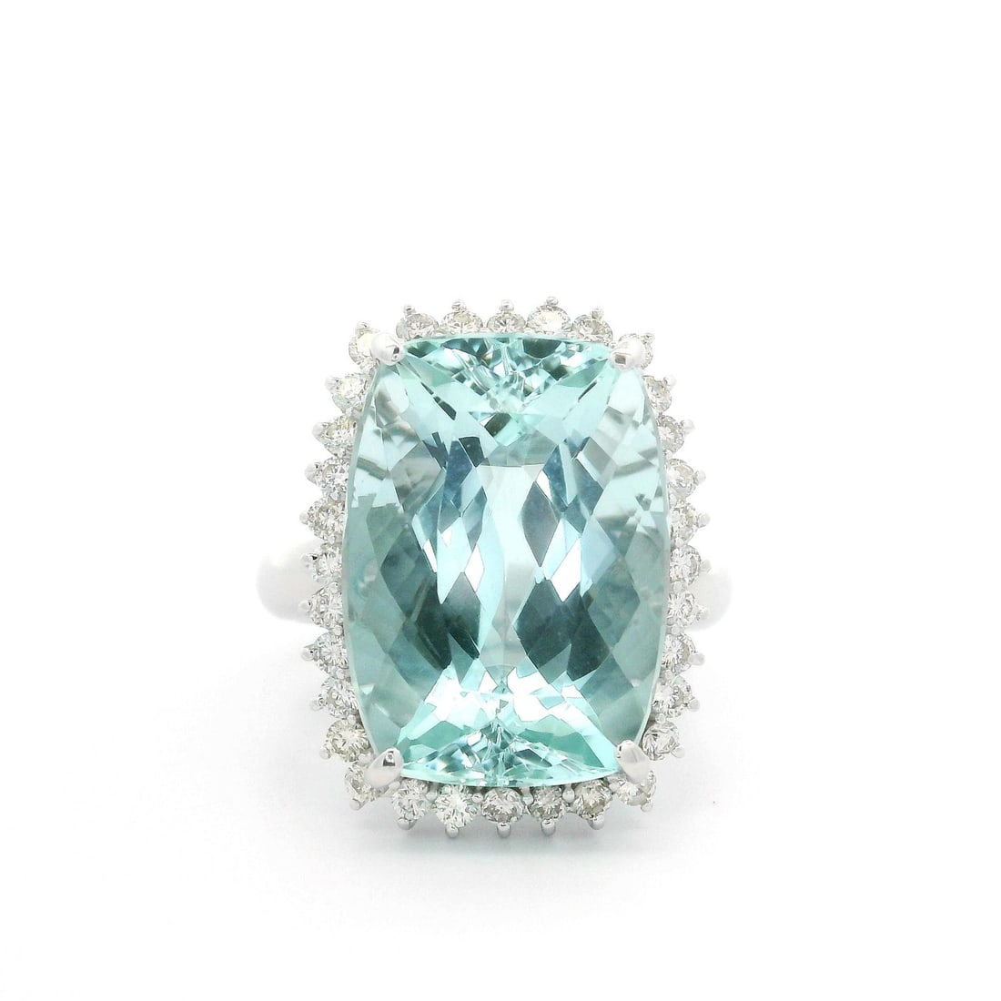 White Gold Aquamarine Diamond Halo Ring Size 7: White Gold Aquamarine Diamond Halo Ring Size 7 This striking statement ring features a large, natural aquamarine as the centerpiece, weighing 14.45 carats and displaying a greenish blue hue. Surroundi