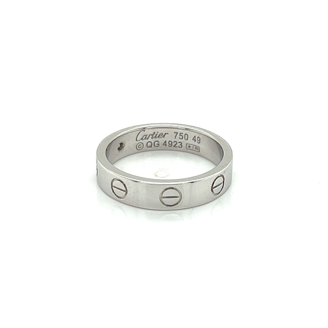 Cartier LOVE Mini Ring 18k White Gold 1 Diamond Size 49 Cert: Cartier LOVE Mini Ring 18k White Gold 1 Diamond Size 49 Cert Authentic Cartier Mini LOVE band ring crafted in 18k white gold, featuring the iconic LOVE screw motif and one natural diamond. This signed