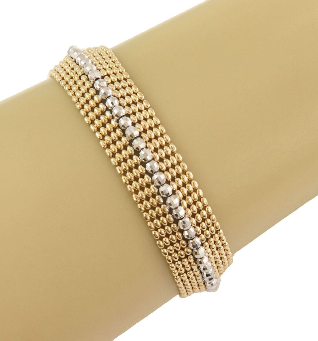 14k Yellow White Gold Wide Mesh Bracelet 7.25 in Italy: 14k Yellow White Gold Wide Mesh Bracelet 7.25 in Italy Vintage estate two-tone beaded mesh bracelet crafted in solid 14k yellow and white gold. This wide chain-style bracelet features a woven mesh lin