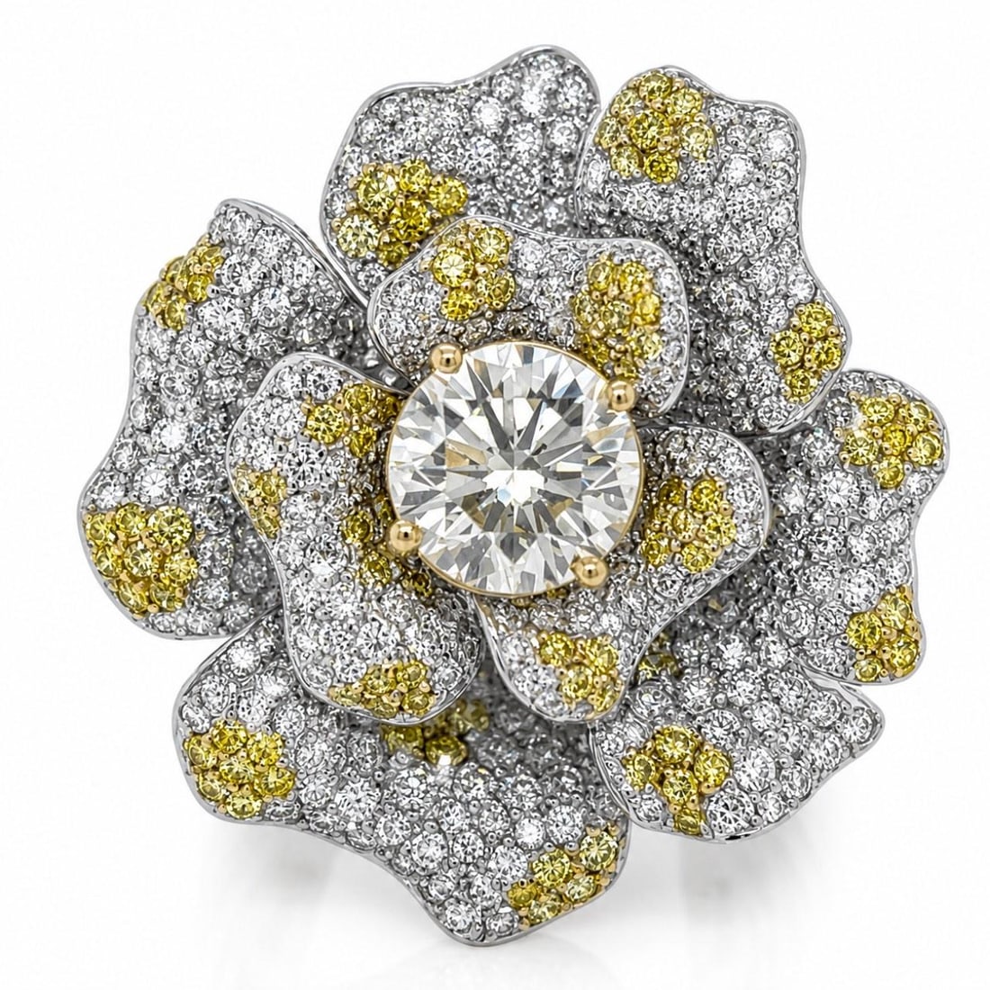 GIA Diamond Flower Ring 18K White Gold Size 6.25: GIA Diamond Flower Ring 18K White Gold Size 6.25 This 18K white gold ring features an elegant flower design, highlighted by a GIA certified 2.14 carat center diamond with W-X color and VS2 clarity. Th