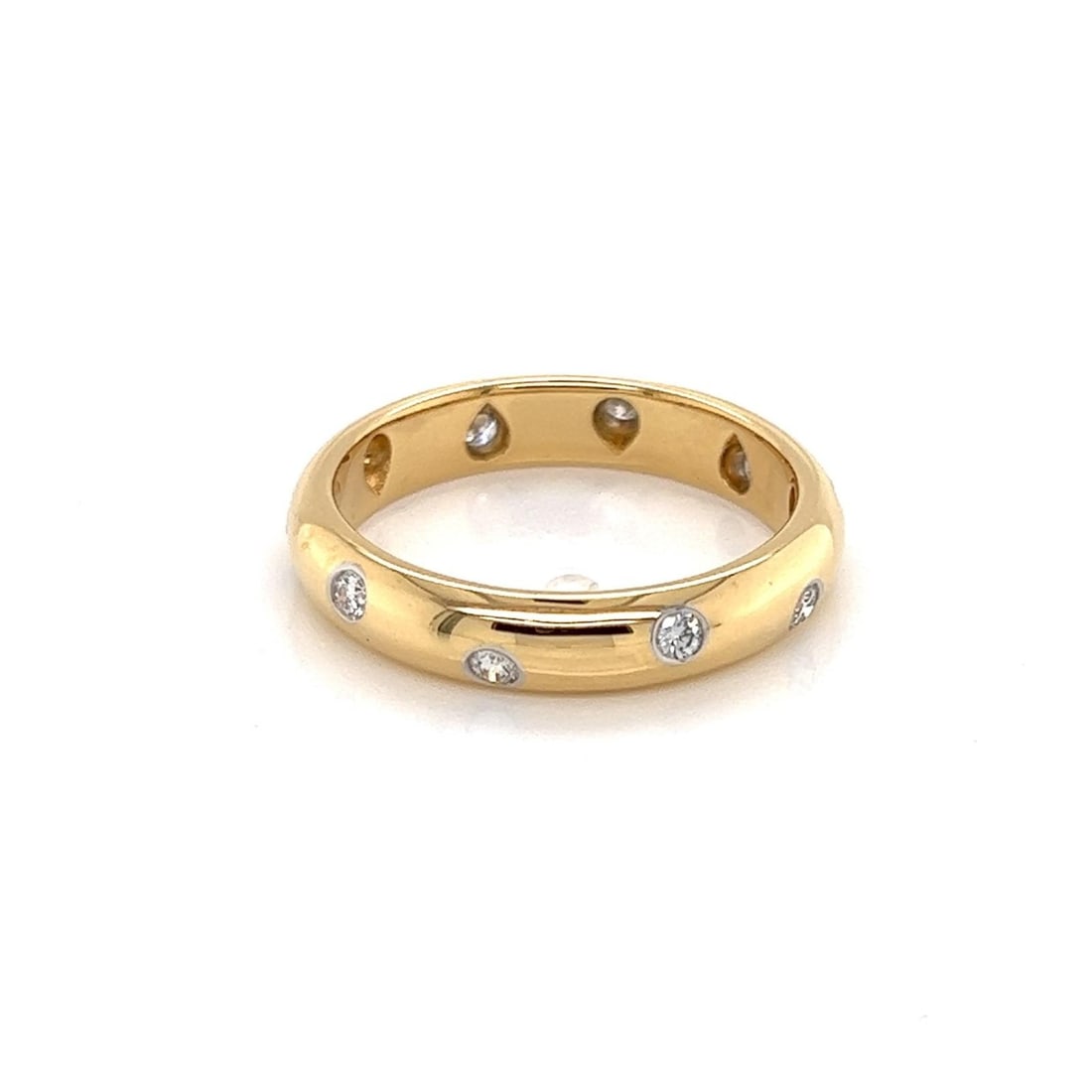 Tiffany & Co. Etoile ring in 18k gold and platinum with diamonds size 7.5: Tiffany & Co. Etoile ring in 18k gold and platinum with diamonds size 7.5 Authentic Tiffany & Co. Etoile Diamond Band Ring with a slim, contemporary design and natural flush-set diamond accents. Craft
