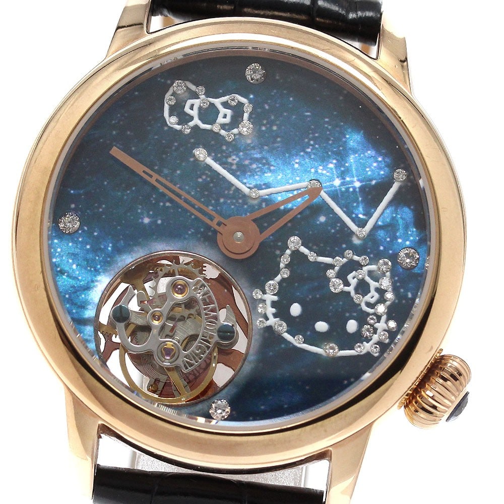 MEMORIGIN Hello Kitty Cosmo Tourbillon Mens Wristwatch Ref 4894379692012: MEMORIGIN Hello Kitty Cosmo Tourbillon Mens Wristwatch Ref 4894379692012 Pre-owned MEMORIGIN Hello Kitty Cosmo Tourbillon men's wristwatch with a blue dial, manual winding movement, and stainless stee