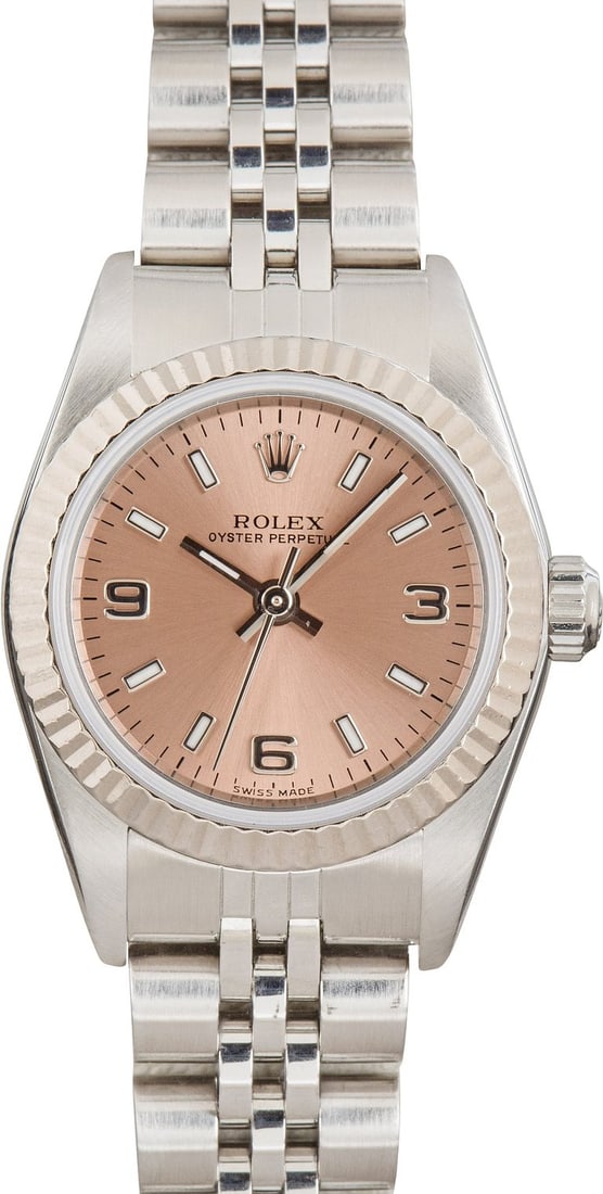 Ladies Rolex 76094 Pink Dial Jubilee Fluted Bezel: Ladies Rolex 76094 Pink Dial Jubilee Fluted Bezel This Rolex Oyster Perpetual features a refined pink dial, complemented by a fluted bezel and Jubilee bracelet. Designed for ladies, this timepiece emb