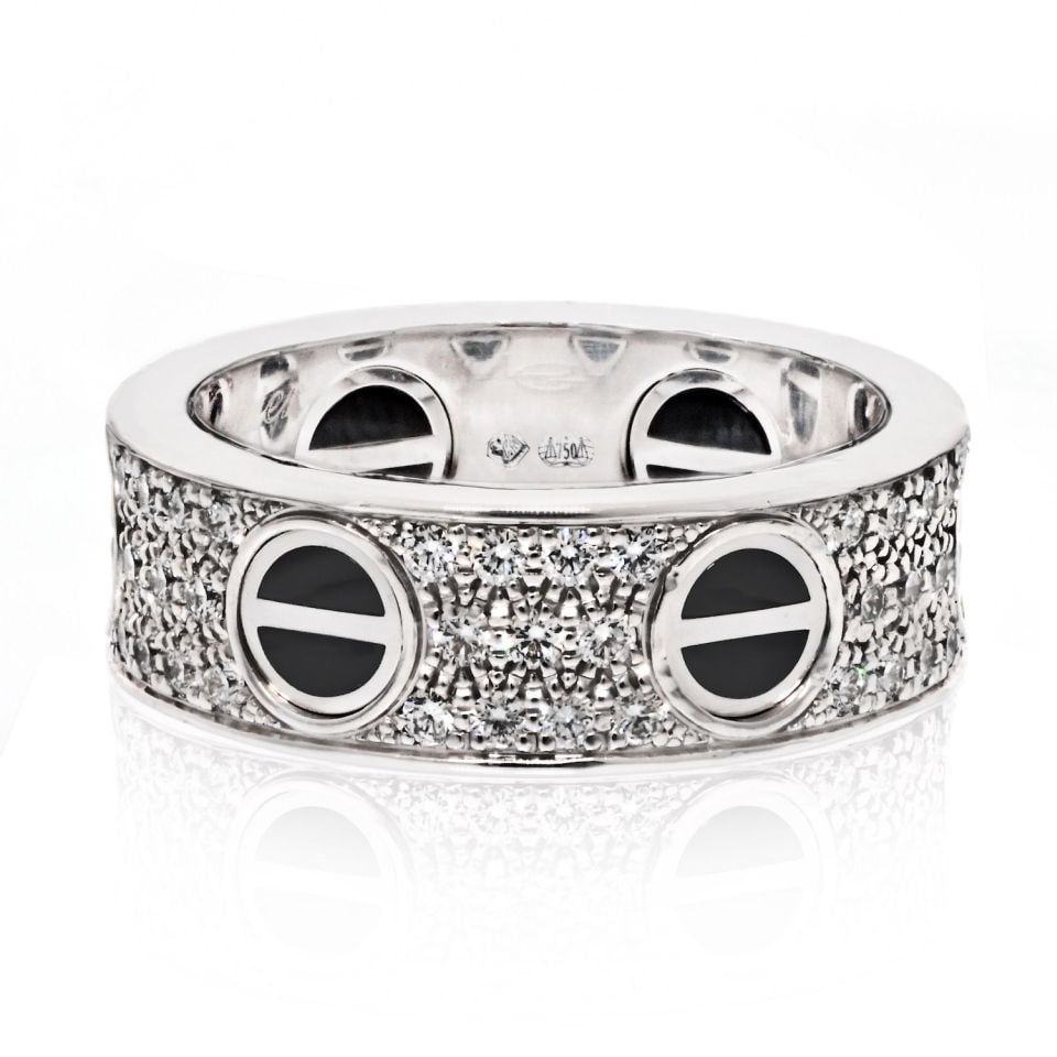 Cartier 18K White Gold Love Ring with Black Ceramic EU 49: Cartier 18K White Gold Love Ring with Black Ceramic EU 49 Discover the timeless elegance of the Cartier 18K White Gold Love Ring featuring striking black ceramic accents. This iconic piece, sized at E