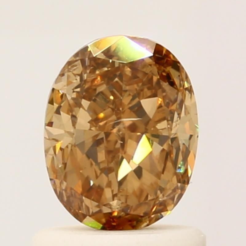Loose Diamond - OVAL 1.02ct Fancy Yellow Brown Yellow: Loose Diamond - OVAL 1.02ct Fancy Yellow Brown Yellow Source: Natural Shape: OVAL Carats: 1.02 Color: Fancy Yellow Brown Yellow Certification: GIA Video: