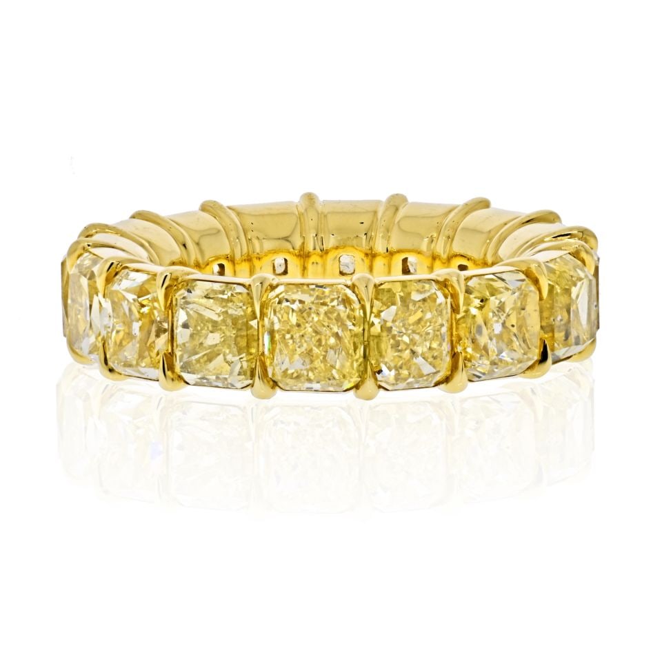 18K Yellow Gold 14.28 Cts GIA Fancy Yellow Cushion Cut Eternity Band: 18K Yellow Gold 14.28 Cts GIA Fancy Yellow Cushion Cut Eternity Band This stunning 18K Yellow Gold Eternity Band features 16 GIA certified fancy yellow cushion cut diamonds with an impressive total we