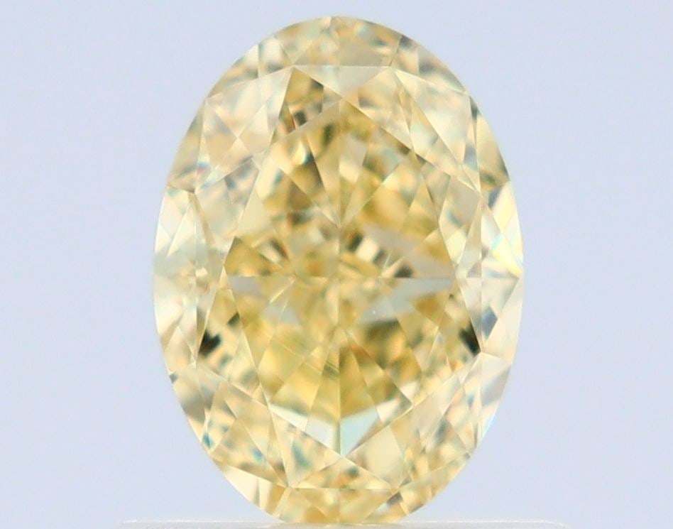 Loose Diamond - OVAL 0.73ct Fancy Yellow VVS1: Loose Diamond - OVAL 0.73ct Fancy Yellow VVS1 Source: Natural Shape: OVAL Carats: 0.73 Color: Fancy Yellow Certification: GIA Video: