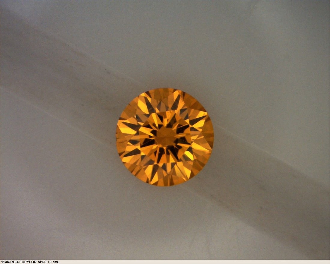 Loose Diamond - ROUND 0.1ct Fancy Deep Yellow Orange: Loose Diamond - ROUND 0.1ct Fancy Deep Yellow Orange Source: Natural Shape: ROUND Carats: 0.1 Color: Fancy Deep Yellow Orange Certification: GIA The Diamond Depot Guarantee: All items in this auction 