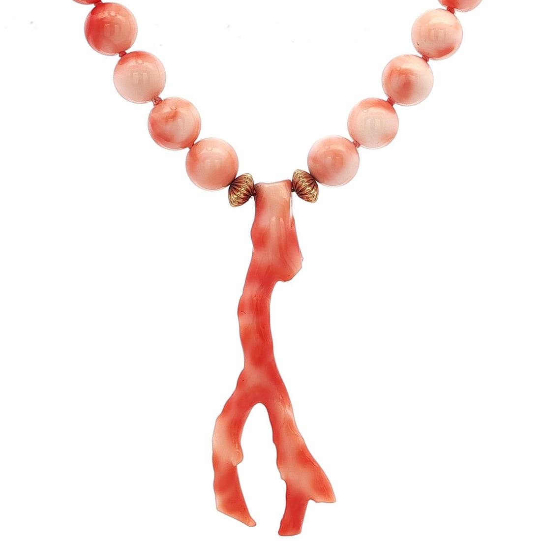 14k Yellow Gold Coral Bead Pendant Necklace with Branch: 14k Yellow Gold Coral Bead Pendant Necklace with Branch This exquisite 14k Yellow Gold necklace features stunning Angel Skin Coral beads complemented by a beautiful branch pendant. The necklace showca