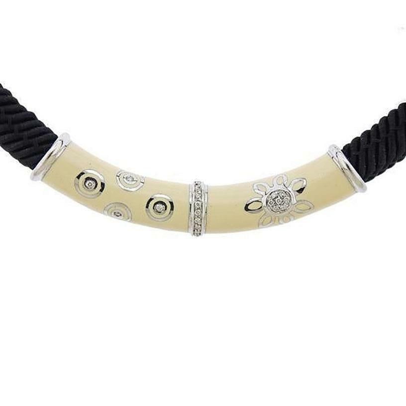 La Nouvelle Bague diamond enamel collar necklace 18k white gold silver cord: La Nouvelle Bague diamond enamel collar necklace 18k white gold silver cord This authentic La Nouvelle Bague collar necklace features a distinctive round, long curved tube pendant crafted from 18k whi