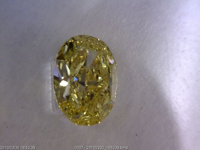 Loose Diamond - OVAL 0.87ct Fancy Intense Yellow I1: Loose Diamond - OVAL 0.87ct Fancy Intense Yellow I1 Source: Natural Shape: OVAL Carats: 0.87 Color: Fancy Intense Yellow Certification: GIA The Diamond Depot Guarantee: All items in this auction are g