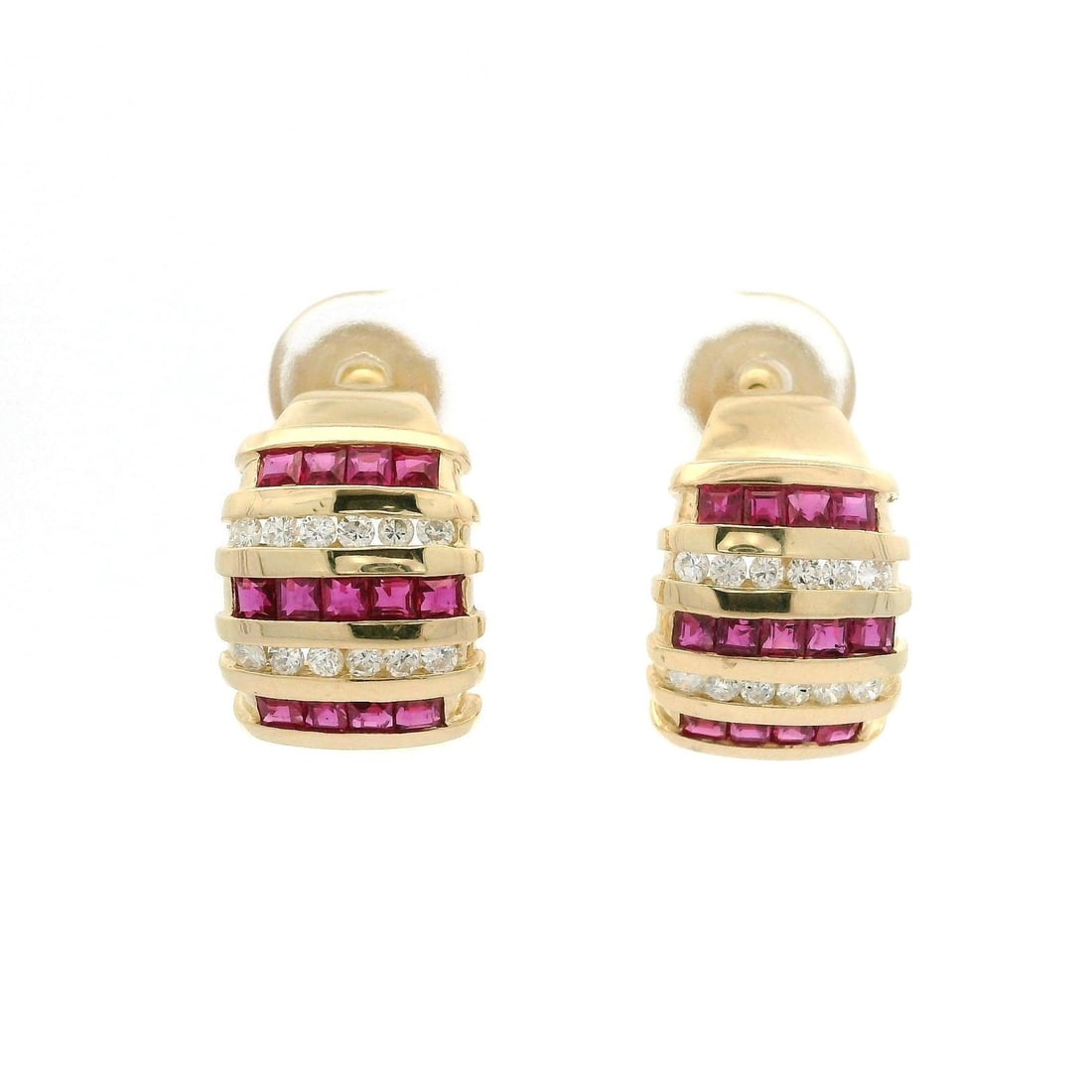 14k Yellow Gold Cuff Earrings with Diamonds and Rubies: 14k Yellow Gold Cuff Earrings with Diamonds and Rubies These stunning 14k Yellow Gold Wide Cuff Earrings are adorned with a captivating combination of diamonds and rubies, perfect for adding a touch o