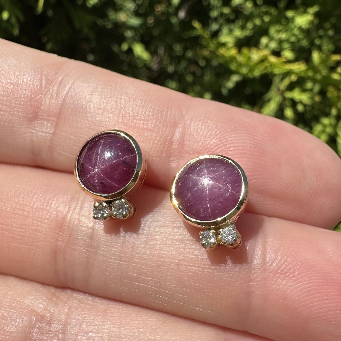 Unbranded Vintage Star Ruby Diamond Stud Earrings in Yellow Gold: Unbranded Vintage Star Ruby Diamond Stud Earrings in Yellow Gold Vintage stud earrings featuring natural star rubies in bezel settings with diamond accents. Crafted in solid yellow gold, this pair has