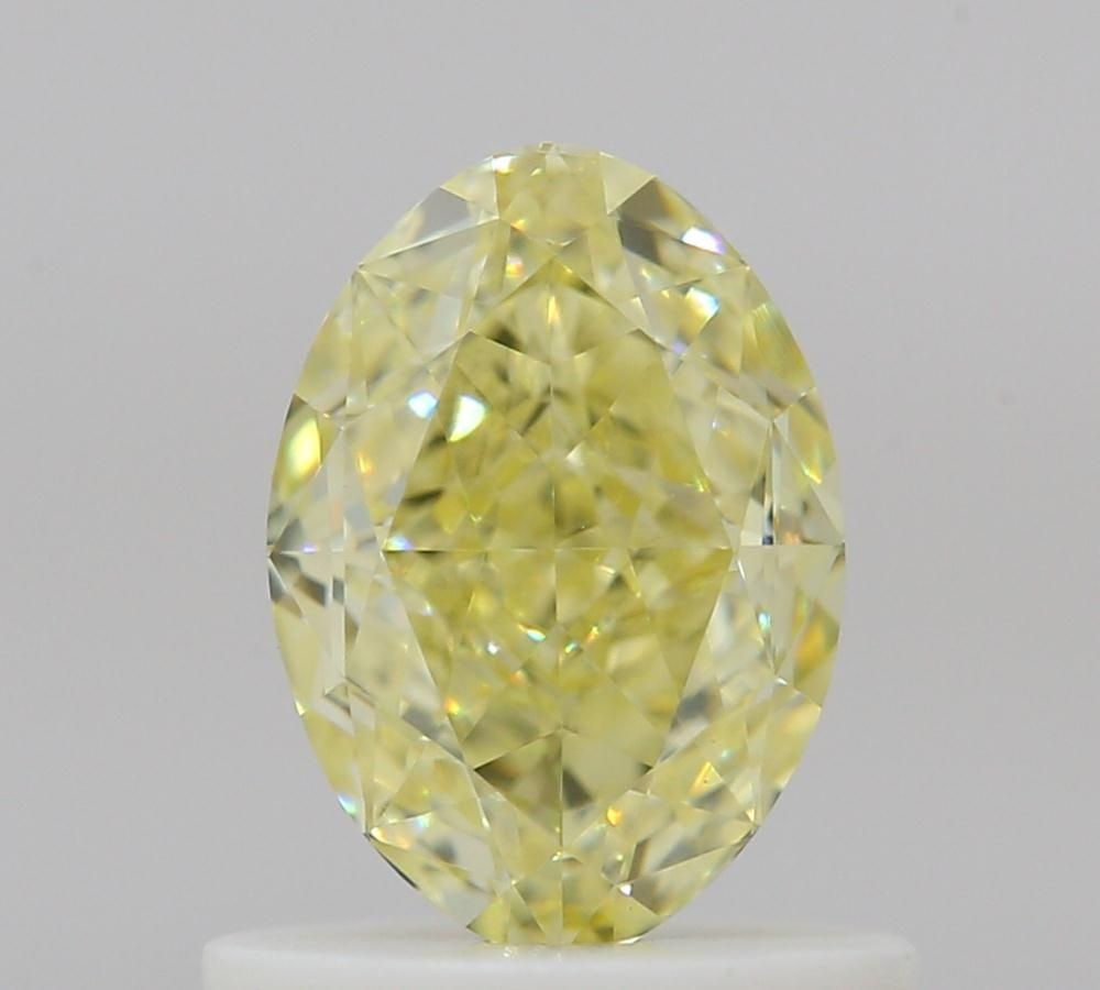 Loose Diamond - OVAL 0.85ct Fancy Yellow VVS2: Loose Diamond - OVAL 0.85ct Fancy Yellow VVS2 Source: Natural Shape: OVAL Carats: 0.85 Color: Fancy Yellow Certification: GIA Video: