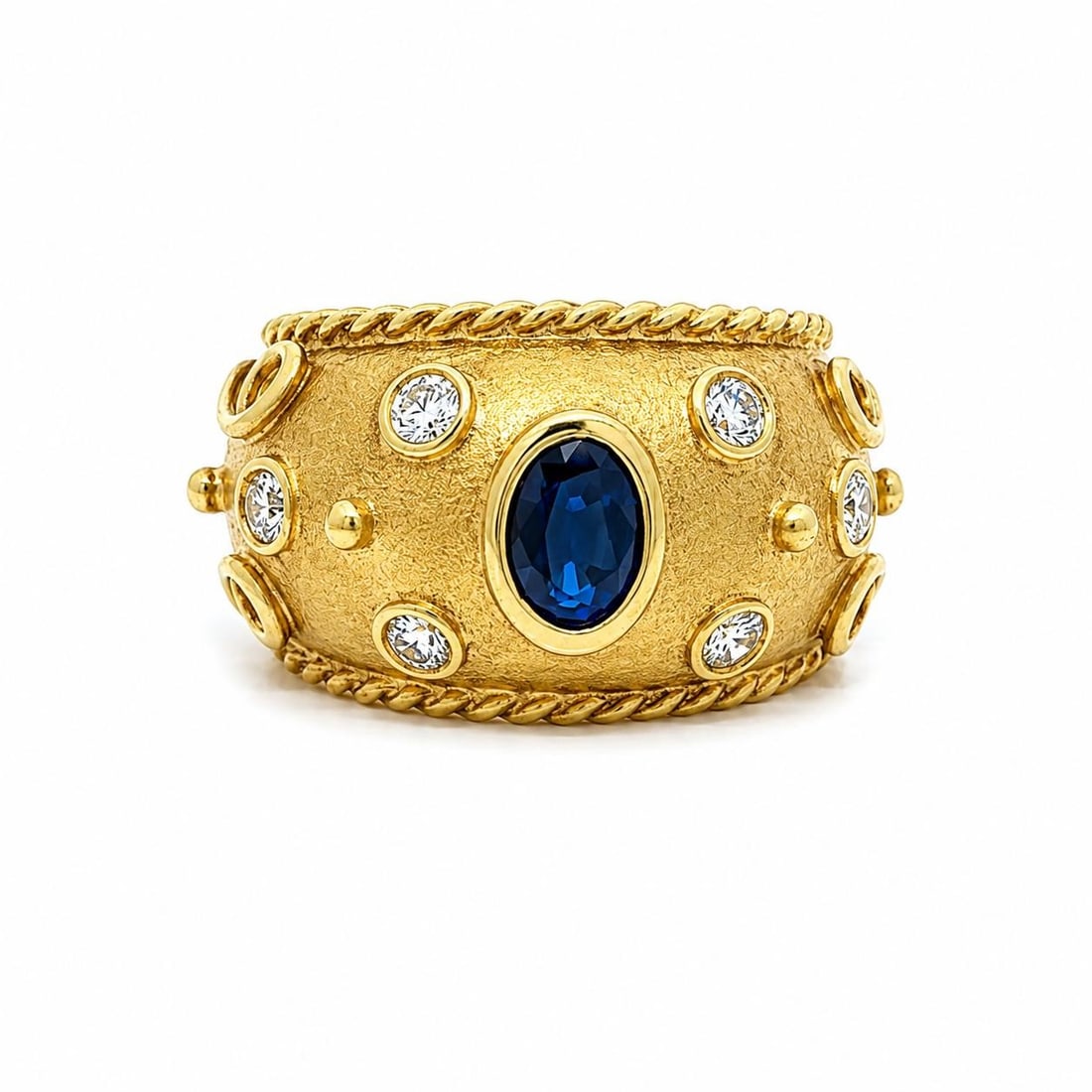 Unbranded 14k Yellow Gold Band Ring with Sapphire and 6 Diamonds: Unbranded 14k Yellow Gold Band Ring with Sapphire and 6 Diamonds Wide cigar band ring crafted in solid 14k yellow gold with a matte scroll work design and twisted cable detailing. The ring features on