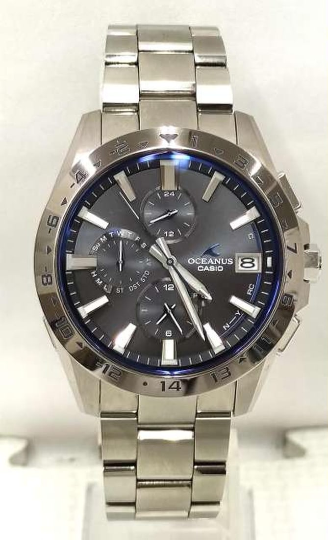 CASIO OCW-T3000-1AJF Oceanus Titanium Mens Wristwatch: CASIO OCW-T3000-1AJF Oceanus Titanium Mens Wristwatch Pre-owned CASIO OCEANUS Classic Line men's wristwatch, model OCW-T3000-1AJF. It features a sporty wide bezel, a simple dial without city code mark