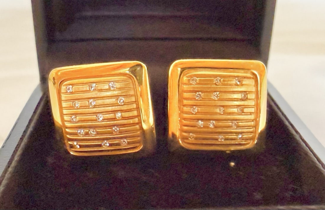 Pair of Canali 18K Yellow Gold Diamond Cufflinks: Pair of Canali 18K Yellow Gold Diamond Cufflinks This pair of Canali cufflinks is crafted from 18K yellow gold and features approximately 0.10 carats of diamonds. Made in Italy and dating to around 20