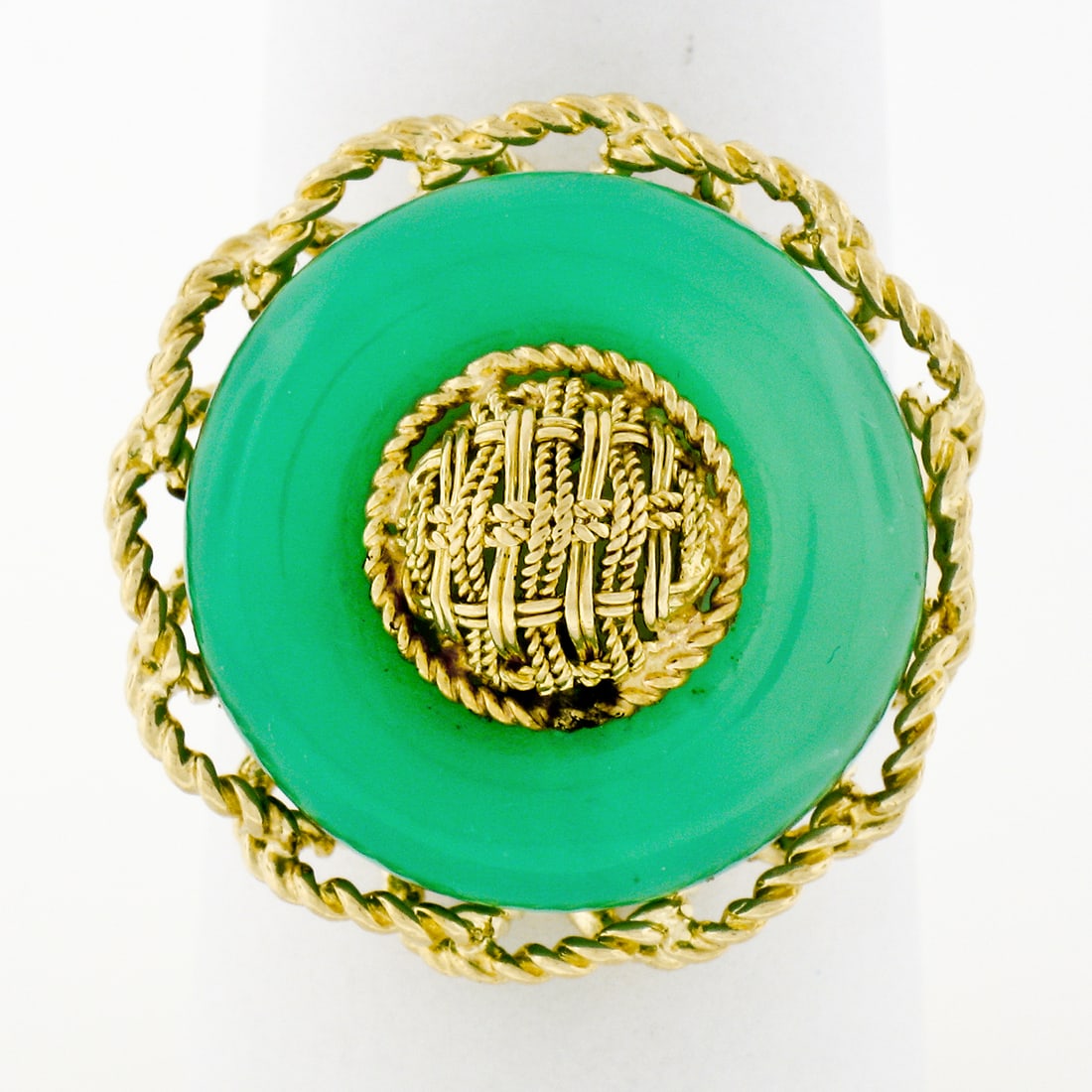 Vintage 18K Yellow Gold Braided Cocktail Jade Ring Size 8: Vintage 18K Yellow Gold Braided Cocktail Jade Ring Size 8 Discover elegance with this Vintage 18K Yellow Gold Braided Twisted Wire Frame Circle Platter Cocktail Jade Ring. This exquisite ring, crafted