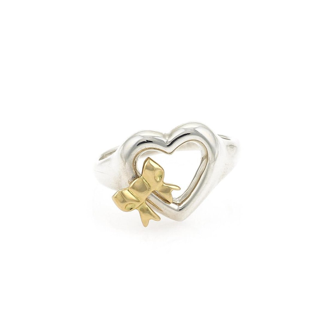 Tiffany & Co. Vintage Heart Ring Sterling Silver 18k Yellow Gold Bow: Tiffany & Co. Vintage Heart Ring Sterling Silver 18k Yellow Gold Bow This exquisite vintage Tiffany & Co. heart ring is a stunning blend of sterling silver and 18k yellow gold. The design features an 
