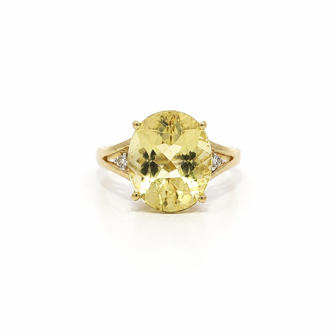 Unbranded 14k Yellow Gold Citrine Ring with 2 Diamond Accents: Unbranded 14k Yellow Gold Citrine Ring with 2 Diamond Accents A women's cocktail ring crafted in solid 14k yellow gold, featuring an oval natural genuine citrine accented by two natural genuine diamon