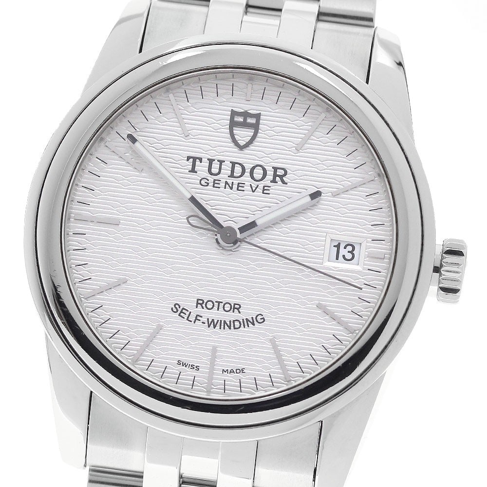 TUDOR Glamour 55000 Automatic Date Mens Wristwatch: TUDOR Glamour 55000 Automatic Date Mens Wristwatch Pre-owned TUDOR Glamour Date automatic men's wristwatch with a silver dial, stainless steel case, and stainless steel bracelet. This watch features a