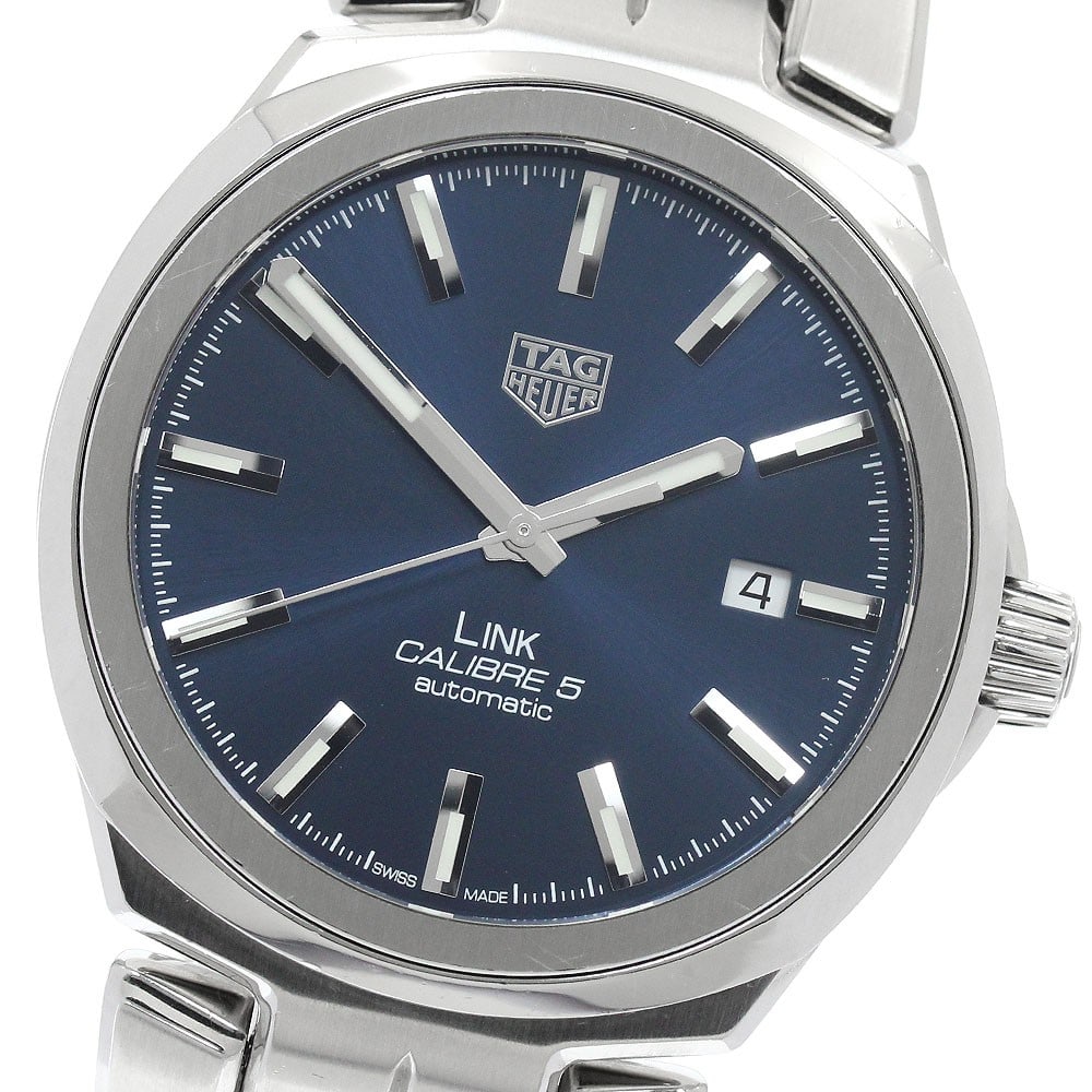 TAG Heuer Link WBC2112.BA0603 mens automatic stainless steel watch: TAG Heuer Link WBC2112.BA0603 mens automatic stainless steel watch Pre-owned TAG Heuer Link Caliber 5 automatic men's wristwatch with a navy dial, stainless steel case and stainless steel bracelet. Th
