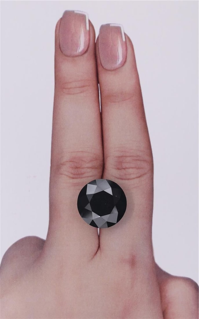 Loose Diamond - ROUND 12.16ct Black: Loose Diamond - ROUND 12.16ct Black Source: Natural Shape: ROUND Carats: 12.16 Color: Black Certification: IGI Video: