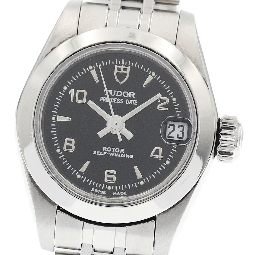 TUDOR Princess Date 92500 Ladies Automatic Black Dial Date Watch: TUDOR Princess Date 92500 Ladies Automatic Black Dial Date Watch This pre-owned Tudor Princess Date ladies wristwatch features a stainless steel case and bracelet with a black dial. The watch is power