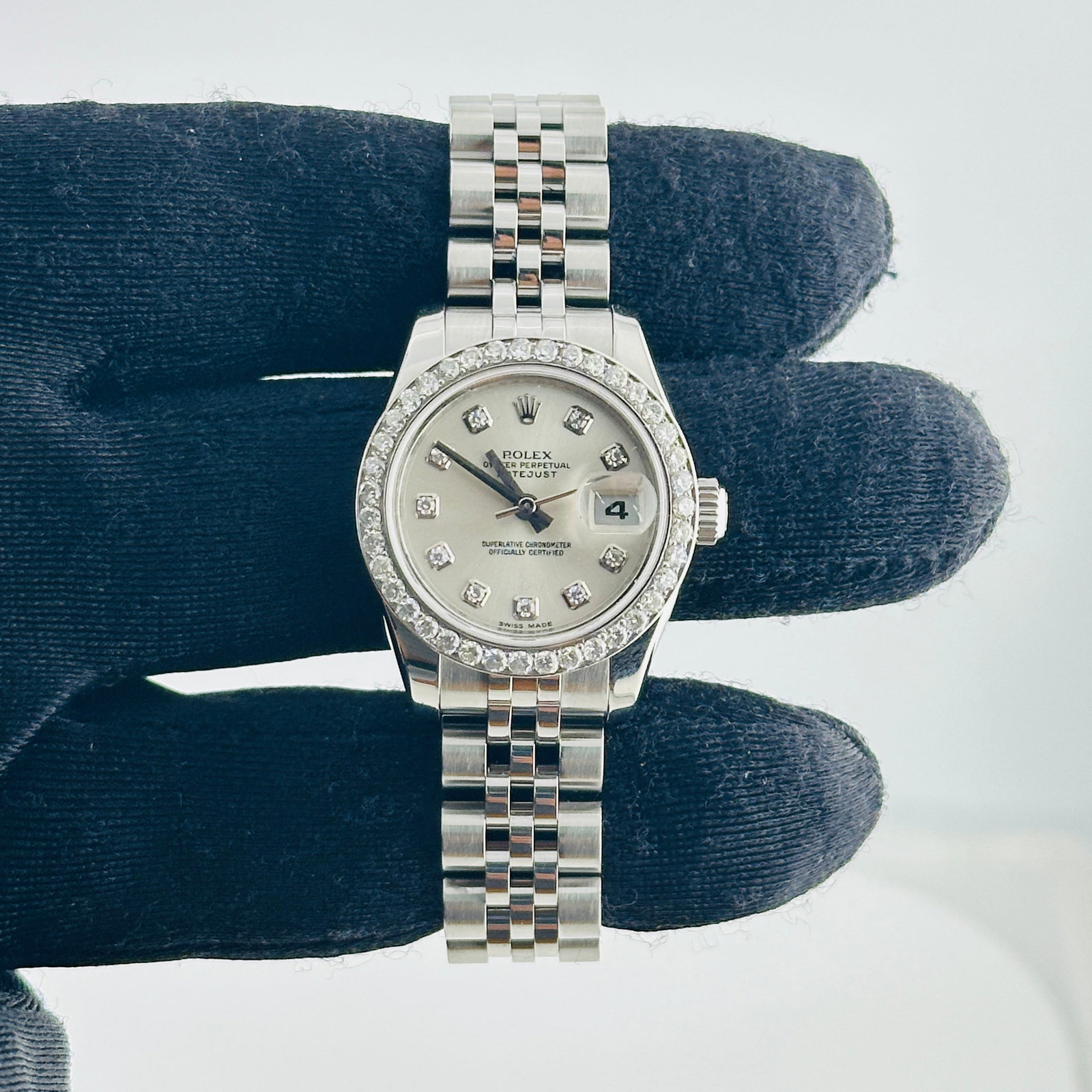 Rolex 179174 Datejust Lady watch silver diamond dial Jubilee hidden clasp: Rolex 179174 Datejust Lady watch silver diamond dial Jubilee hidden clasp Ladies Rolex Datejust Lady watch, reference 179174, with a silver diamond factory dial, Aftermarket pave diamond bezel, and Ju