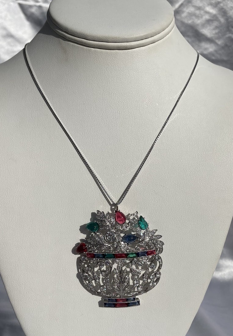 French Art Deco Platinum Diamond Pendant Necklace with Bakelite Box: French Art Deco Platinum Diamond Pendant Necklace with Bakelite Box This exquisite French Art Deco pendant brooch necklace, crafted in platinum, is a true collector's item from the 1930s. It features 