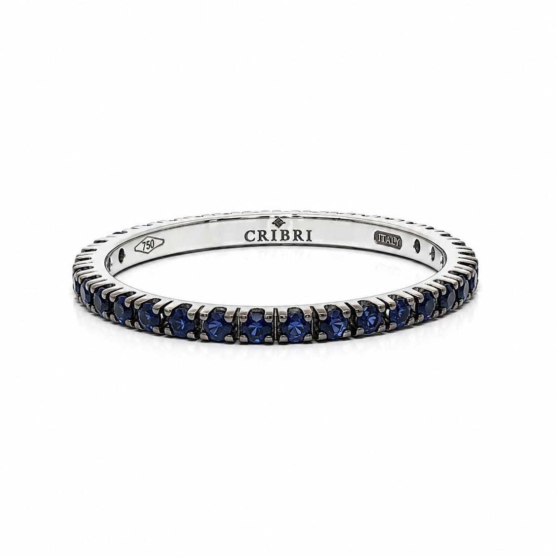 Unbranded 18k White Gold Sapphire Eternity Band Ring 0.45ctw Size 6.5: Unbranded 18k White Gold Sapphire Eternity Band Ring 0.45ctw Size 6.5 Un-used dainty eternity band ring featuring numerous natural blue sapphires in a round brilliant cut. The stones are prong set in 