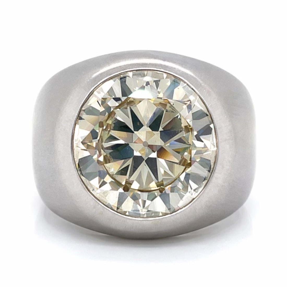 Transitional Cut 12.51 Carat Diamond Ring in 18K White Gold Size 12: Transitional Cut 12.51 Carat Diamond Ring in 18K White Gold Size 12 This ring features a 12.51 carat transitional-cut diamond set in 18K white gold. The diamond is graded M-N color with VS1 clarity. T