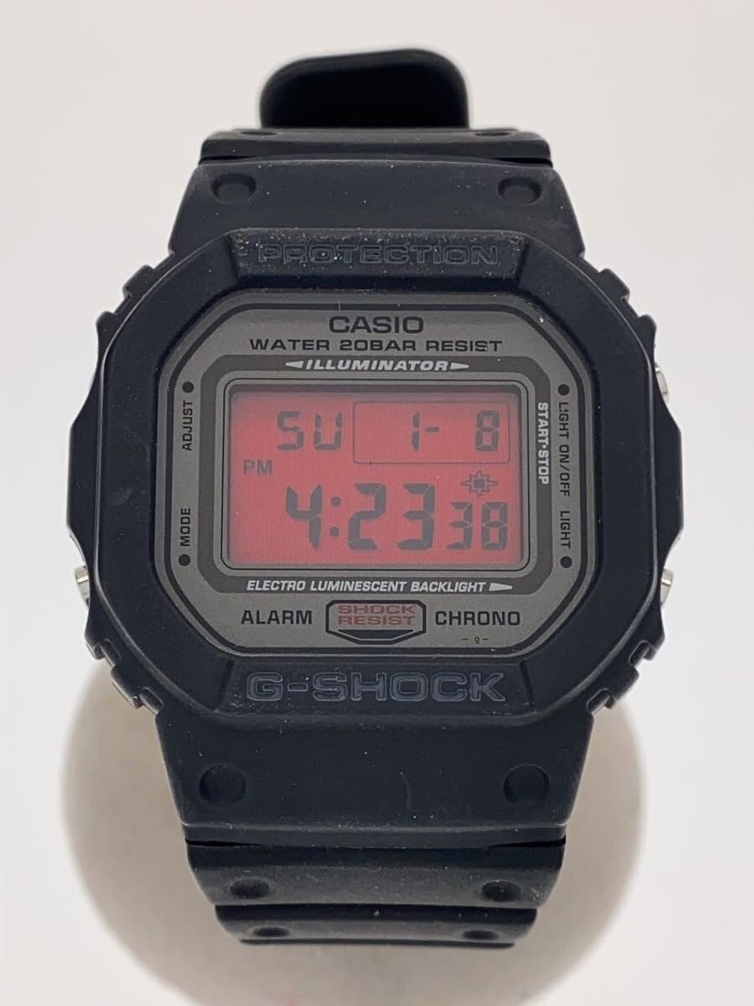 Casio G Shock DW-5000ML-1JF Black Wristwatch: Casio G Shock DW-5000ML-1JF Black Wristwatch This CASIO G-SHOCK DW-5000ML-1JF men's wristwatch features a durable black design and is made in Japan. The watch is pre-owned and graded as B, with visibl